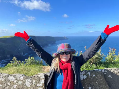 Two travelers hiking the Cliffs of Moher on a Traveling Professor Ireland tours